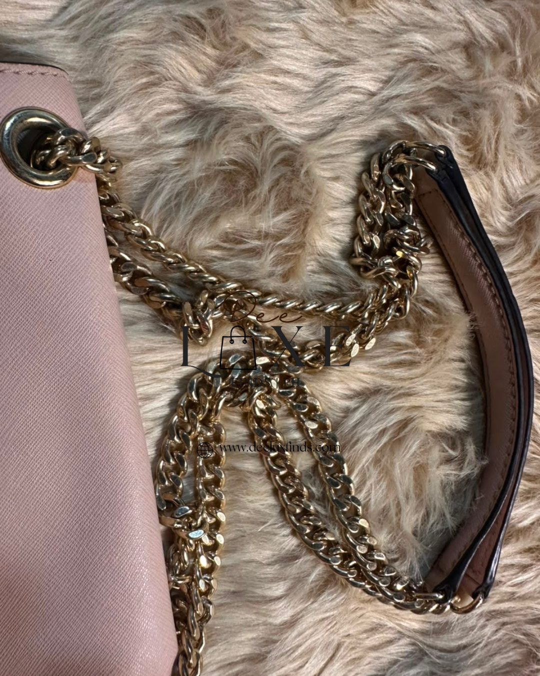 MK Sloan Blush - bottom scuff and turnlock tarnish