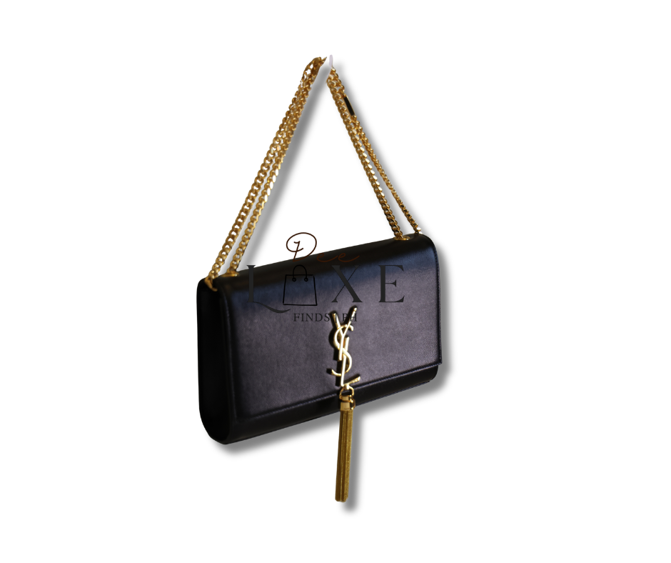 Saint Laurent YSL gold-tone logo plaque close-up