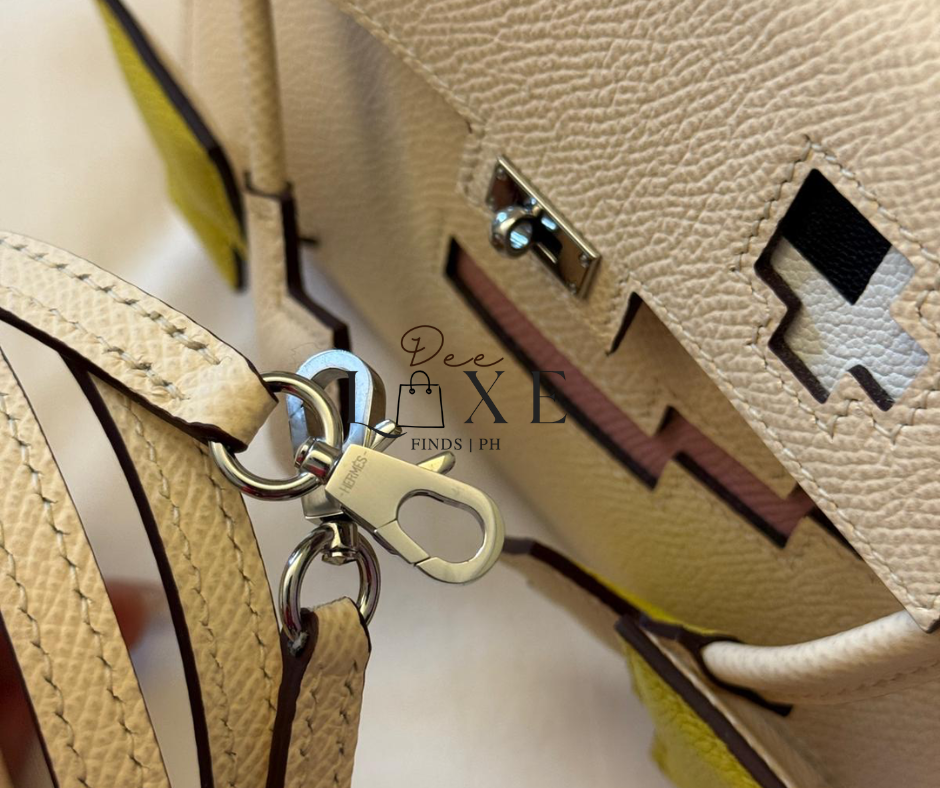 Hermès palladium hardware clasp and strap detail